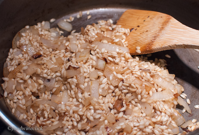 Start by browning onions and rice