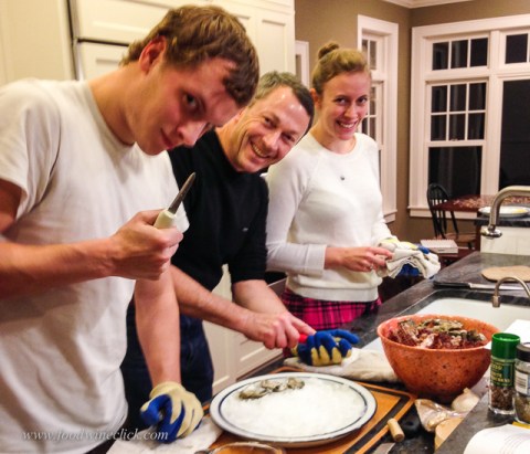 Peter (left) and Casey (right) joined in the battle to open the oysters