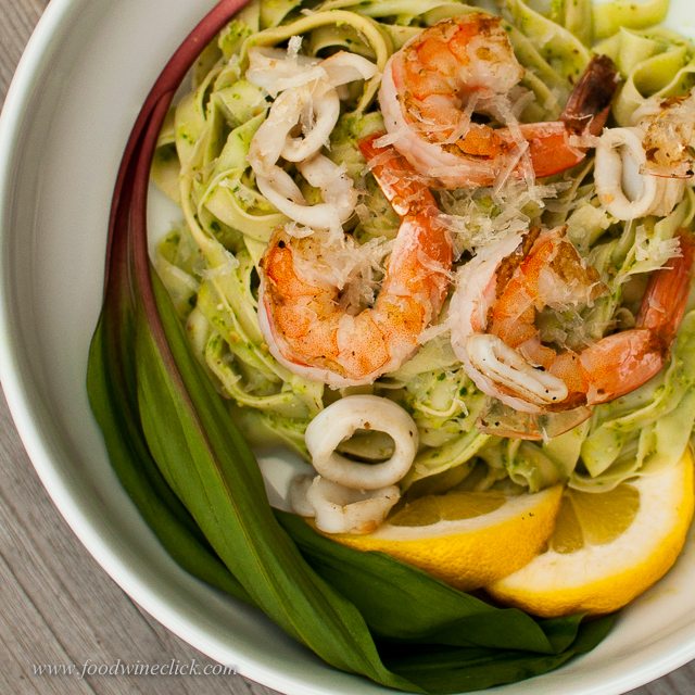 Top the pasta with some shrimp and calamari