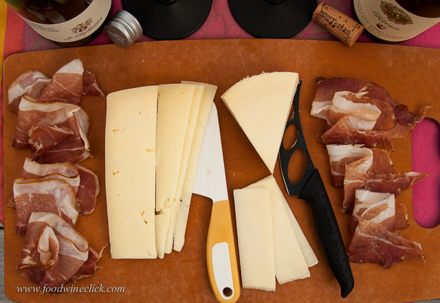 Our Apertivo board features two different Speck hams with Trugole and Provolone Valpadana cheeses.