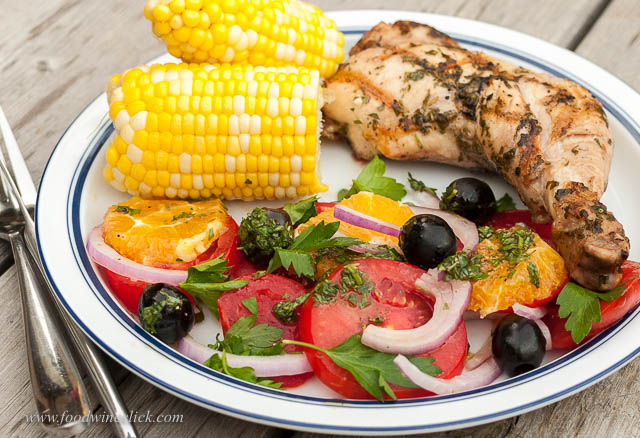 Southern France with a touch of Minnesota. Grilled chicken with bistro salad of tomatoes & oranges. Sweet corn on the side, you know, for that exotic foreign touch.