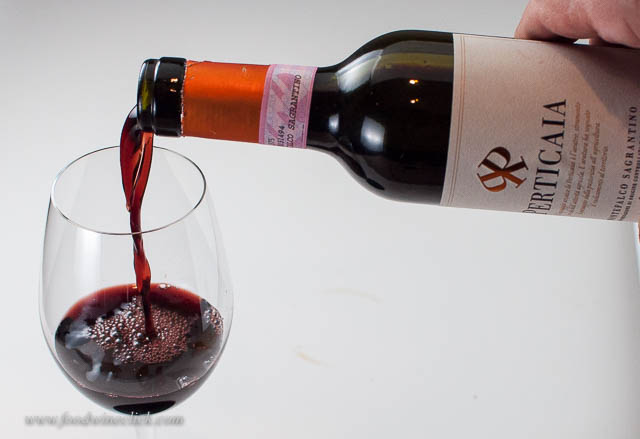This wine pours inky dark in the glass.