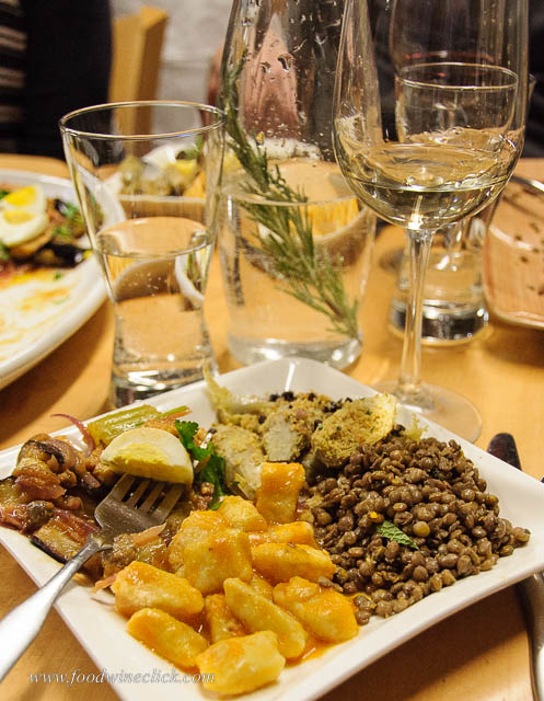 Eggplant caponata, ricotta gnocchi, lentils, and stuffed artichokes