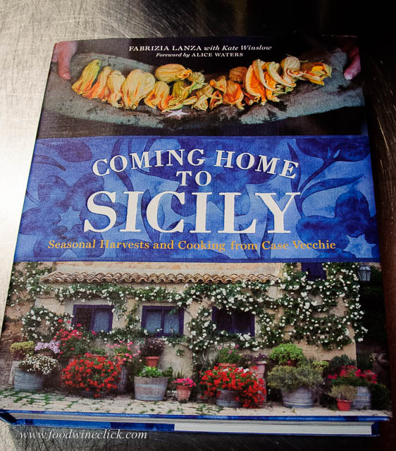 Tonight, we're cooking from "Coming Home to Sicily" by Fabrizia Lanza. The Casa Vecchie cooking school is part of the Regaleali Estate and Winery, where our evening's wine is from.