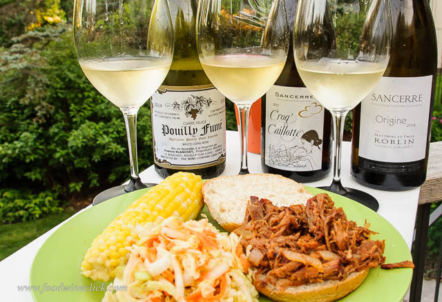 Pulled pork sandwiches just prior to the application of the coleslaw. Spicy vinegar sauce and slaw were perfect with acidic French Sauvignon Blanc. Who knew?