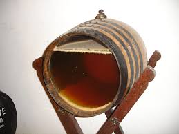 1 barrel from a solera system showing the wine, airspace above and flor (yeast cap on the surface). (photo courtesy of wikipedia.org)