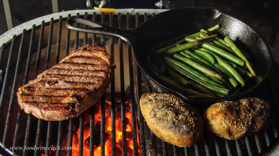 Primo grill with ribeye steak