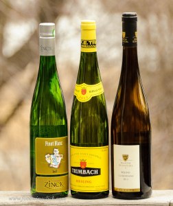 Tall, narrow flute shaped bottles