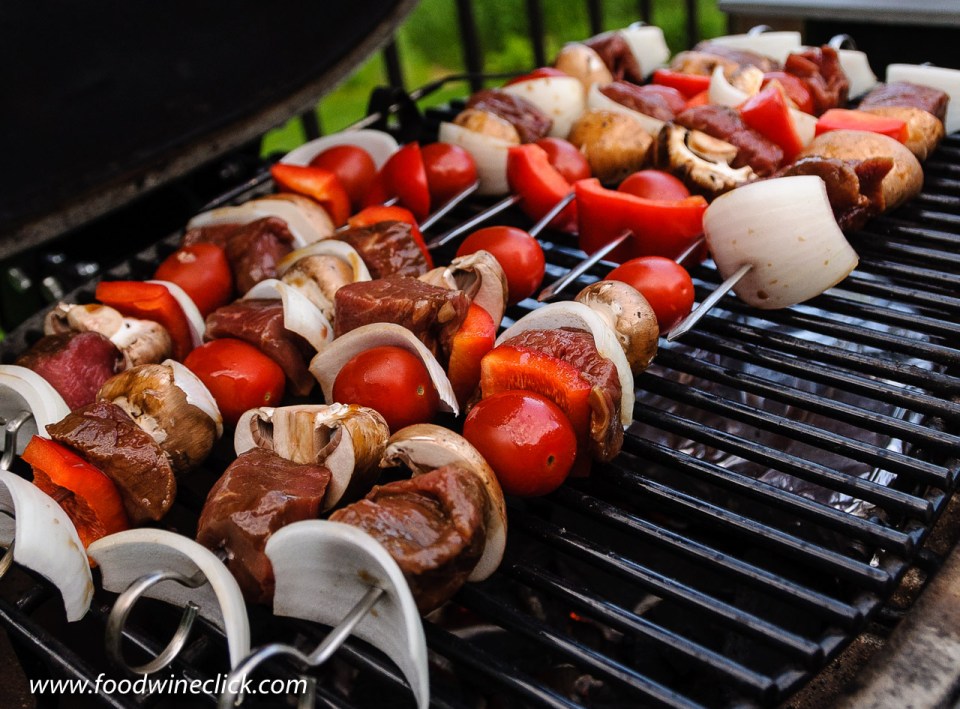 beef skewers cooked on a Primo Ceramic Grill