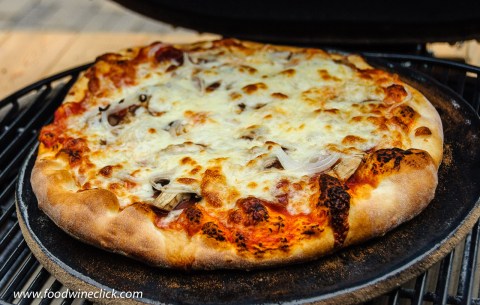 Pizza cooked on a Primo ceramic grill