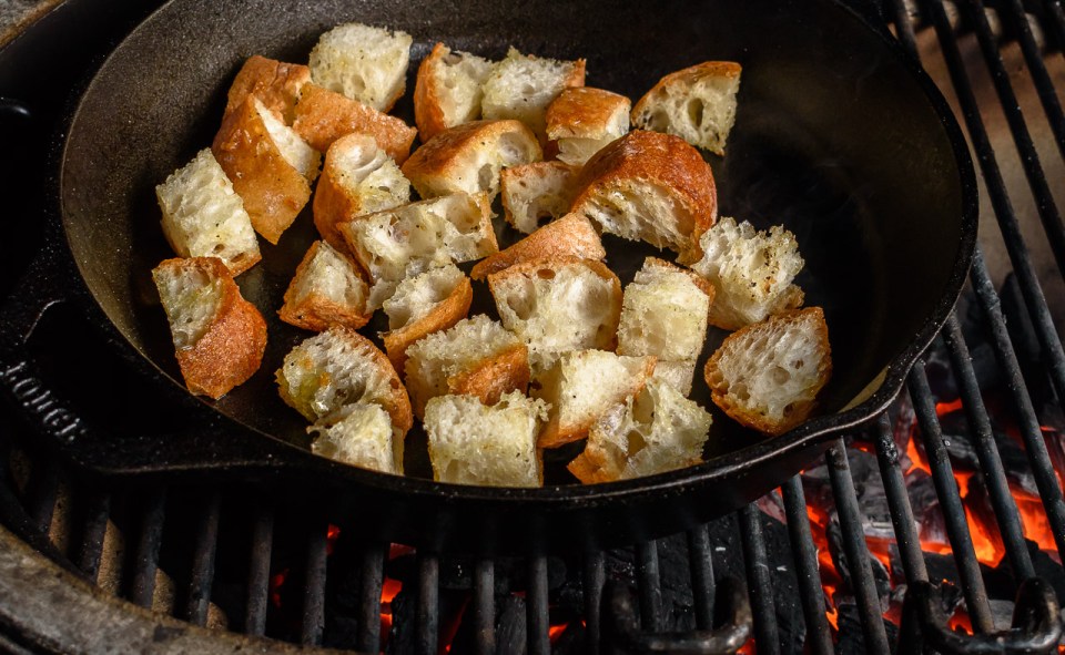 Croutons made in a cast iron skillet on the grill