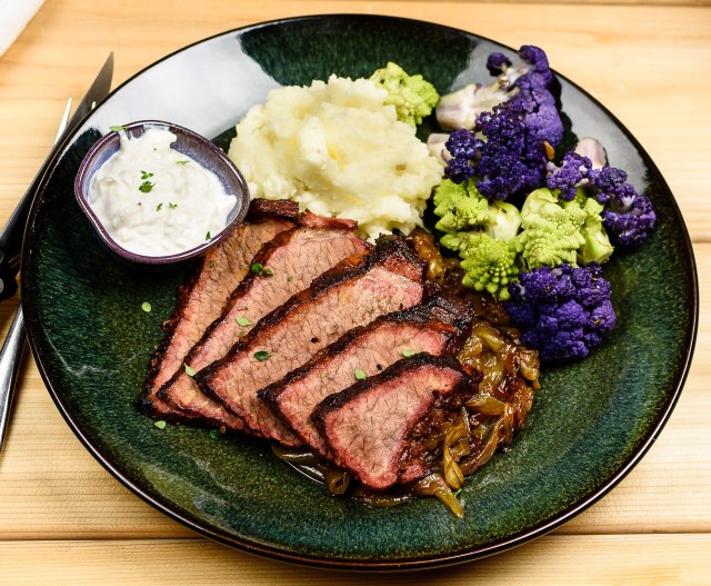 Grill braised brisket with onions and horseradish sauce