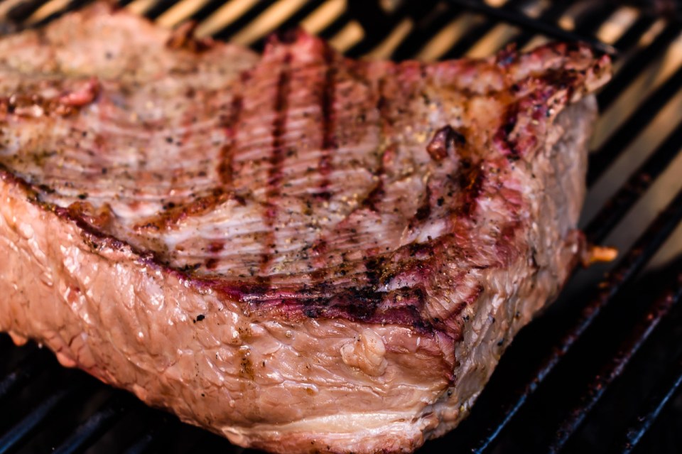 browning the beef brisket on the grill