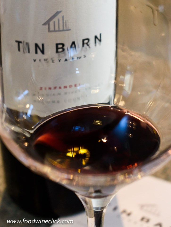 Beautiful red wine colors in the glass at Tin Barn winery