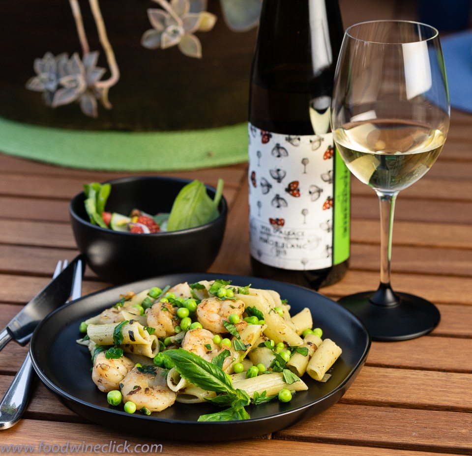 Fresh peas top a Shrimp, penne & basil dish paired with Alsace Pinot Blanc at www.foodwineclick.com